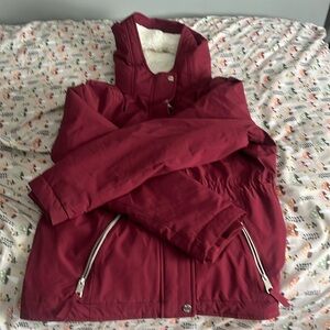 Burgundy jacket,fluff in the inside not in sleeve,good condition
